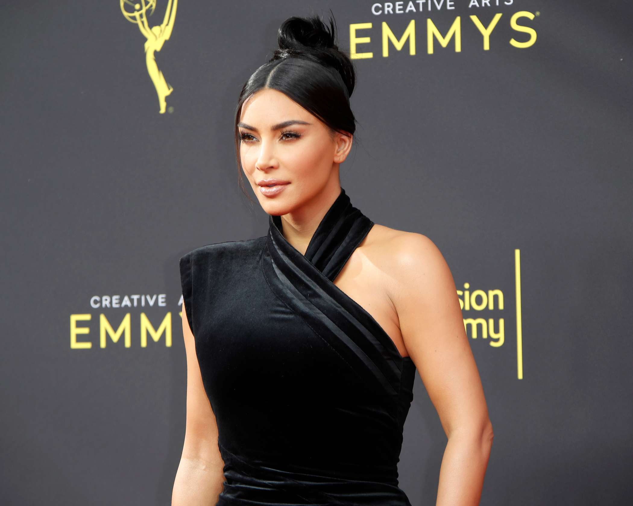 Kim Kardashian's black faceless full-body suit has a Kanye West
